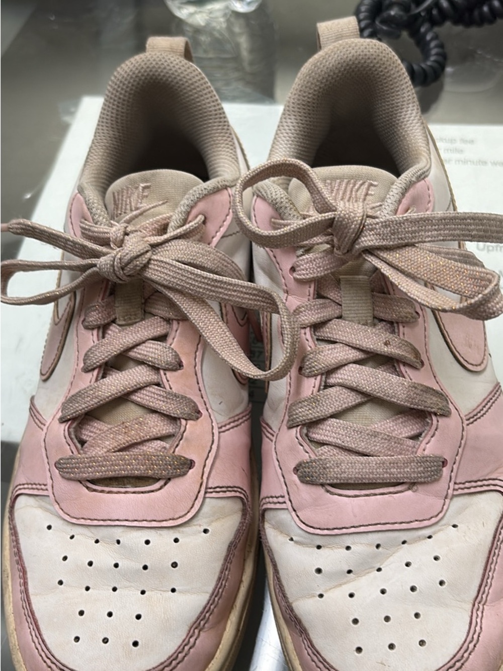 Nike Women's Pink and Cream Low-Top Sneakers with Lace-Up Design